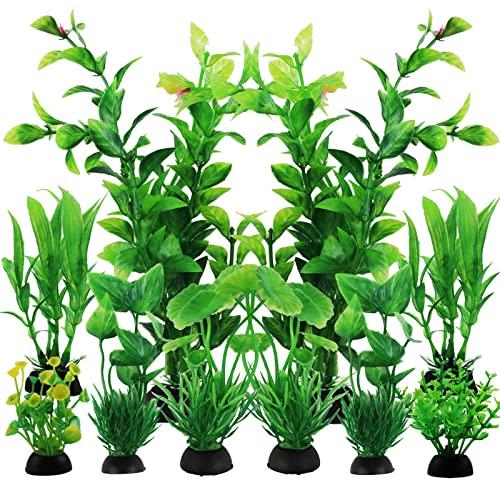 Assorted plastic aquarium plants in various sizes for reducing filter flow
